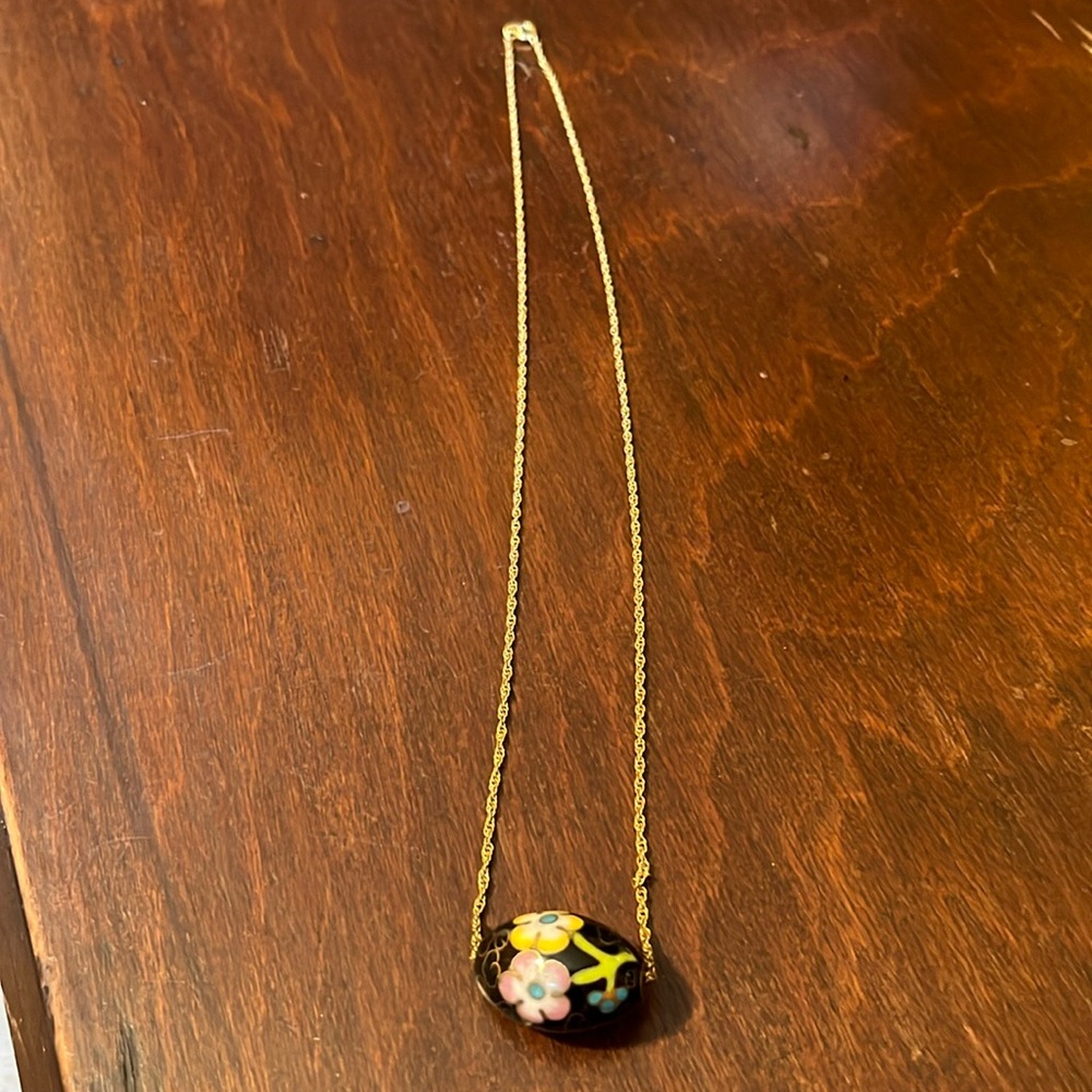 Vintage black cloisonné bead on gold chain